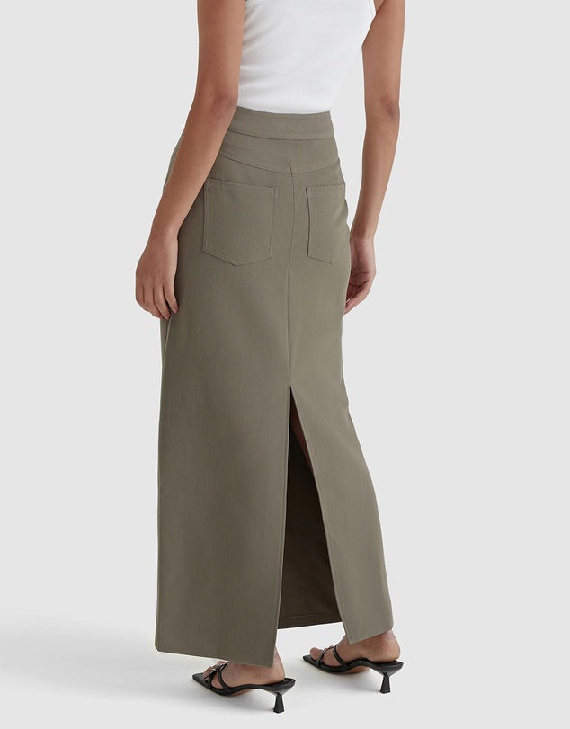 Midi skirt in true Olive. Split at the back. Pair with white tank and white jacket.