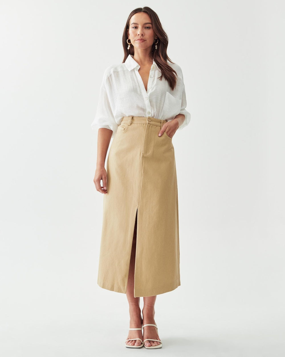 A classic A-line skirt for a more smart casual lifestyle. This neutral colour is a perfect base to team with both light and dark tops.