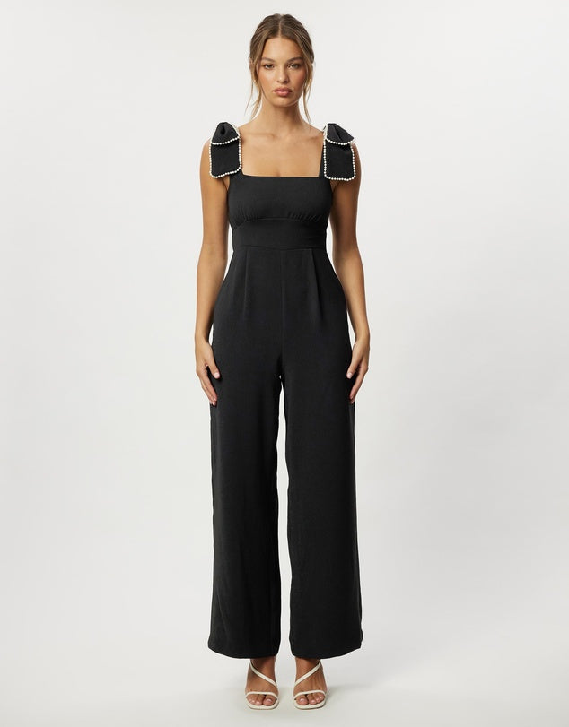 A divine jumpsuit with incredible details. This is such a flattering silhouette and the detail on the straps is so pretty. Perfect for a date night or event day or night.