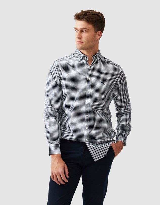 A classic and versatile navy gingham check shirt, crafted in soft cotton yarn and woven in Italy. This shirt is timeless and perfect from work to weekend. Style with chinos, jeans and dress pants.