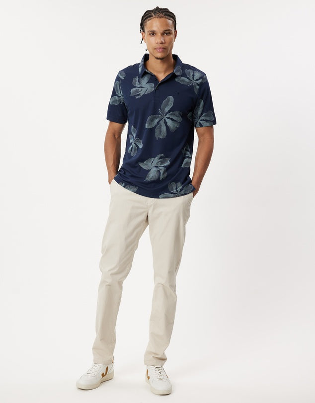 A cool cotton tropical print polo shirt perfect for everyday summer and drinks out on a hot day/night