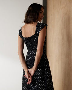 Midi Dress in spot print. Edgy dress you can pair with the red jumper tucked in to a high waisted belt.