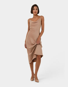 A core staple slip dress in neutral tone. This versatile dress can be worn with heels at night or even layered under a knit for transeasonal looks.