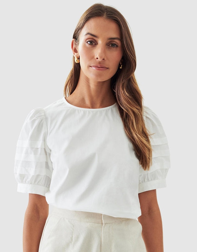 White Blouse with sleeve detail. Pair with either your new black stripe skirt or culottes.