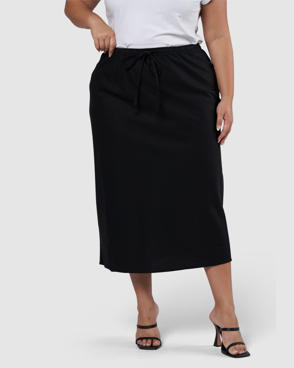 Linen A-Line skirt in neutral black so you can mix and match tops easily.